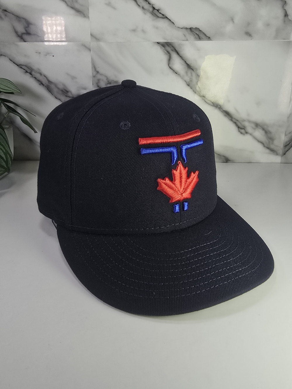 Blue Jays Cap. Men's Navy Blue Cap with Red Maple Leaf Embroidery. City Connect